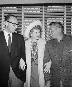Performers Lucille Ball and Desi Arnaz Posing With CBS Affiliate