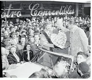 Performers Lucille Ball and Desi Arnaz Riding in Heart Association Motorcade