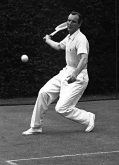 Prints of 23rd July 1949: British tennis player Fred Perry (1909 - 1995), the first person ever to win all four major singles titles gives a demonstration of a forehand drive A Photographic Legacy: Perry Forehand