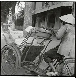 Hanoi Prints: Person Riding in a Velo-Taxi