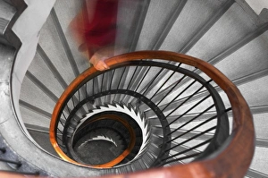 Person on spiral staircase