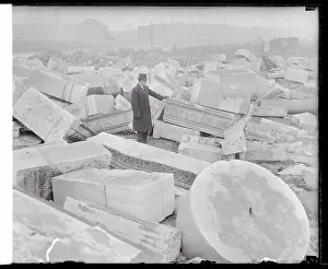 Person Standing Among Broken Marble Columns