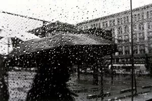 Henri Silberman Collection Gallery: Person with umbrella in rain