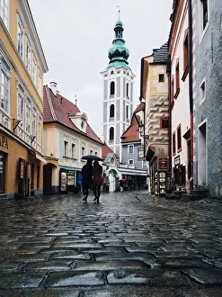 Sadness Prints: Two persons with one umbrella wandering in the cobbled streets in the old town of Cesky Krumlov