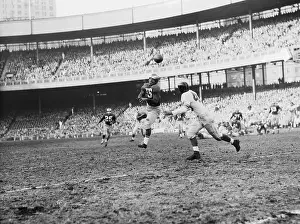 Pete Pihos Leaping for Football