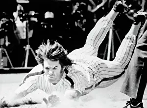 Pete Rose Sliding into Home