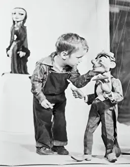 Peter Baird Inspecting Puppet