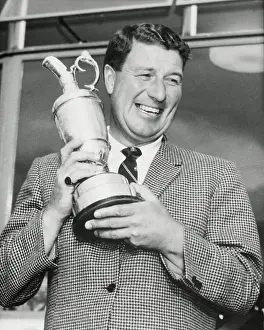 Peter Thomson Holding Trophy