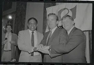 Willie Mays Prints: Peter Ueberroth Joining Hands with Baseball Players