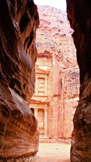 Desert Gallery: Petra Archaeological site - The Treasury seen from the Siq exit
