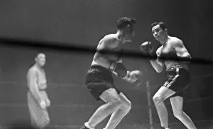 Punching Prints: Petrolle Leads with Right Against Ross