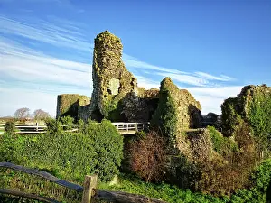 Prints of Winter sunshine shining on the entrance and highest portion of the Pevensey Castle ruins UK Travel Destinations Prints: Pevensey Castle ruins
