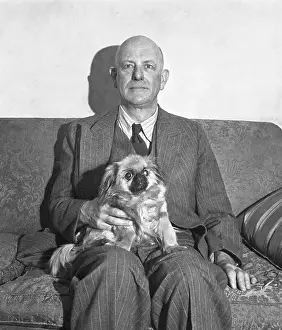 P.G. Wodehouse Posing with Dog