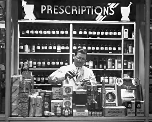 Counter Prints: Pharmacist At Prescription Counter