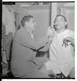 Phil Rizzuto Lighting Cigar for Yogi Berra