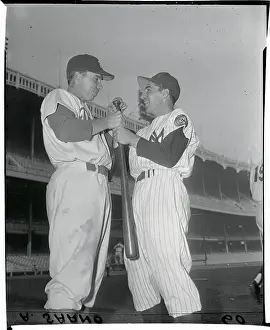 Phil Rizzuto and Peewee Reese Holding Bat