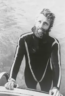 Phillipe Cousteau Pausing in Diving Uniform