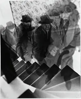 Prints of NEW YORK - 1957: A haunting, artistic photo montage (created in the darkroom by layering negatives together) of a man climbing a staircase, in 1957 in New York City, New York Portraits, Artworks, and Montages from a Visionary Photographer: Photo Montage of Man Climbing Stairs