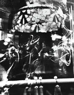 Prints of NEW YORK - 1960: An artistic photo montage (created in the darkroom by layering negatives together) of patrons drinking at a crowded bar in 1960 in New York City, New York Portraits, Artworks, and Montages from a Visionary Photographer: Photo Montage of Patrons Drinking at a Bar in 1960