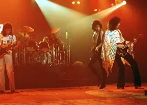 Prints of British rock band Queen perform in concert with Freddie Mercury wearing black leotard at the Forum on December 22, 1977 in Inglewood, California Queen Unleashed: Photo of Queen