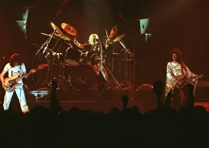 Prints of British rock band Queen perform in concert with Freddie Mercury wearing black leotard at the Forum on December 22, 1977 in Inglewood, California Queen Unleashed: Photo of Queen