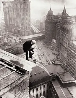Risk Prints: Photographer Atop Skyscraper