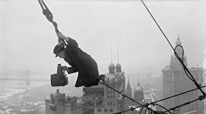 Photographer Balanced on Rope