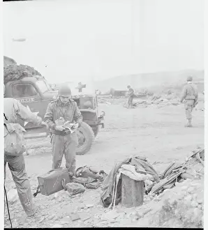 Photographer Bert Brandt Preparing His Equipment for Work