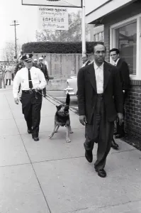Oppression Prints: Photographer Followed by Police and Dog