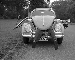 Photographer Sticking Out of VW Beetle