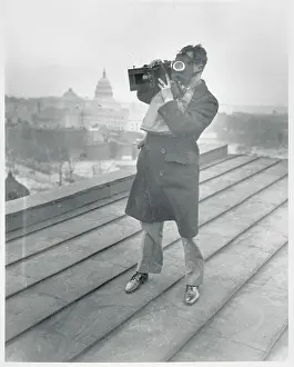 Precision Prints: Photographer Wearing Gas Mask