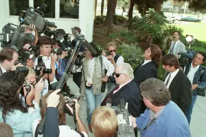 Prints of (Original Caption) 9/26/1990-Santa Monica, California- Actor Marlon Brando is mobbed by photographers as he arrives at Superior Court for a pre-trial hearing in his son Christian's murder trial The Iconic Moments Captured: Photographers Mob Marlon Brando