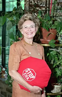 Stop Sign Prints: Phyills Schlafly Holding a Stop Era Pillow