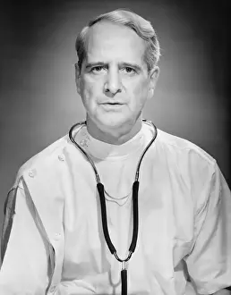 50 59 Years Prints: Physician posing in studio, (B&W), portrait