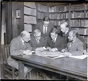 Planning Prints: Physicists and Astronomers Seated Planning