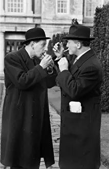 Prints of 28th February 1953: Actor Geoffrey Sumner learning the pickpocket's art from former policeman Bob Fabian (right) for a Rank film Always A Bride' A Photographic Legacy: Pick-Pocket