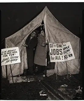 Picketing Prints: Picketers Find Rain Shelter in Tent