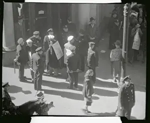 Picketers Walking with Signs in Street