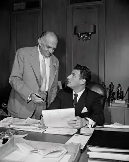 Picture of Stanley Kramer and Harry Cohn Signing Contract