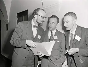 Pierre Auger Conversing with Colleagues