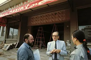 Pierre Cardin Instructing Workers