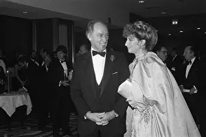 Prints of (Original Caption) A Legendary Career: Pierre Trudeau and Barbara Streisand Posing as Dinner Guests