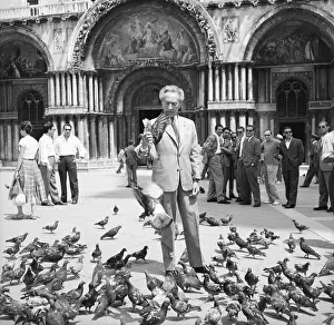 Pigeons Prints: Pigeons Surround Jean Cocteau