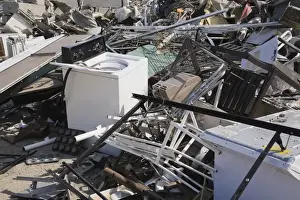 Appliance Prints: Pile of discarded household and industrial items at a scrap metal recycling centre