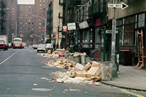Piles of Garbage Lying on the Street Curb