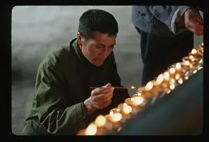 Pilgrim Prints: Pilgrim Lights Candles at Temple