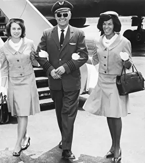 Pilot Escorts Two Flight Attendants