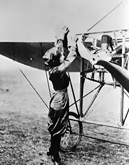 Propeller Prints: Pilot Harriet Quimby Starting Airplane