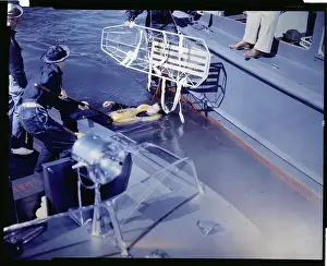 Pilot Being Lifted From Water