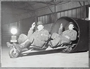 Pipe Inspectors Riding on Special Vehicle